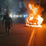 రన్నింగ్​ కారులో చెలరేగిన మంటలు.. ప్రాణాలతో బయటపడ్డ ఐటీ ఉద్యోగి